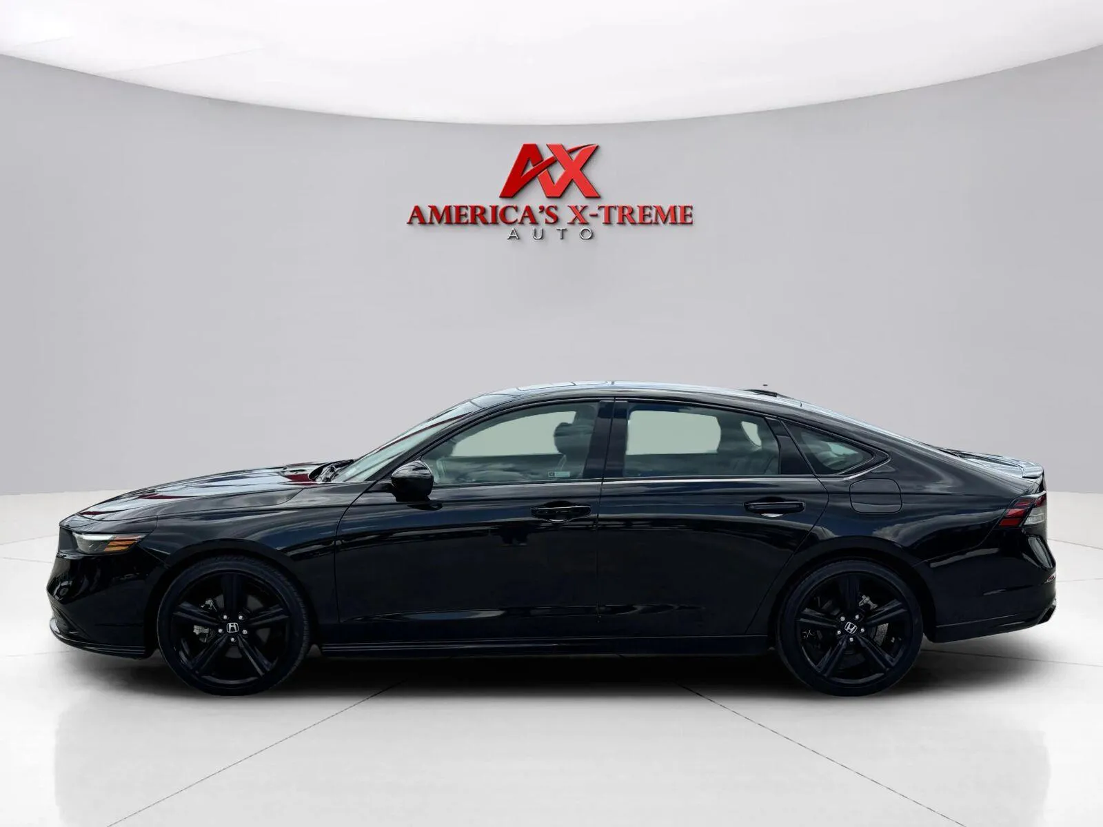 Photos of 2024 Honda Accord Hybrid Sport-L for sale in Houston, TX at America's Xtreme Auto Sales & Auto Repair | Luxury Used Cars & Trucks Dealership
