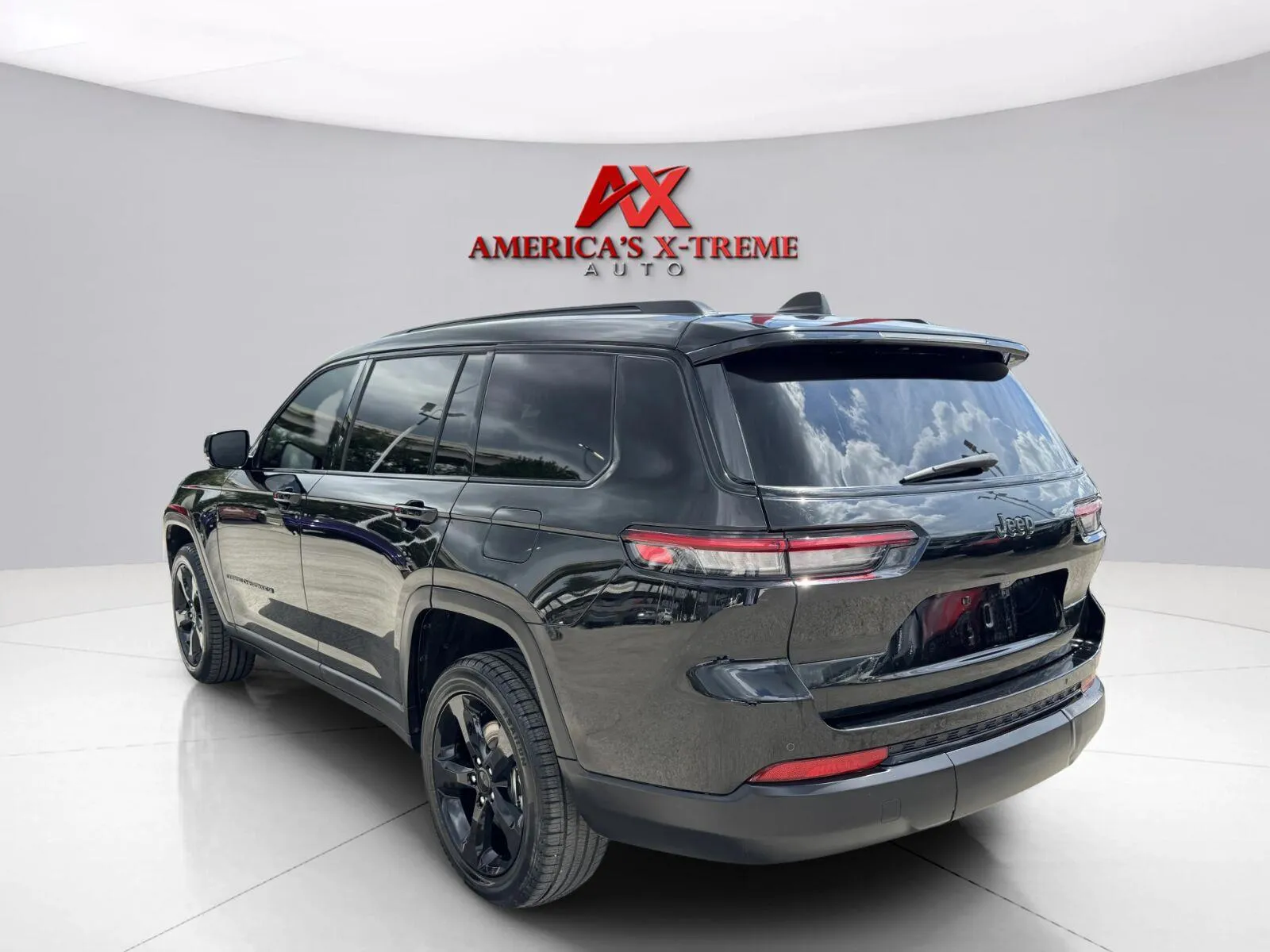 Another view of 2024 Jeep Grand Cherokee L Altitude for sale in Houston, TX at America's Xtreme Auto Sales & Auto Repair | Luxury Used Cars & Trucks Dealership