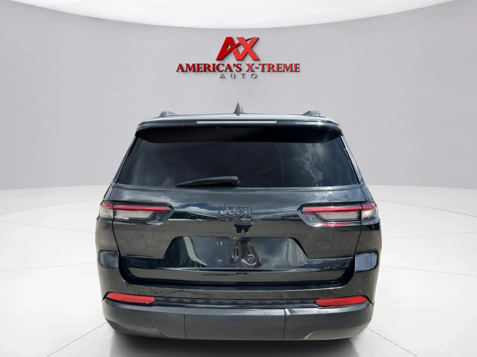 More photos of 2024 Jeep Grand Cherokee L Altitude at America's Xtreme Auto Sales & Auto Repair | Luxury Used Cars & Trucks Dealership, TX