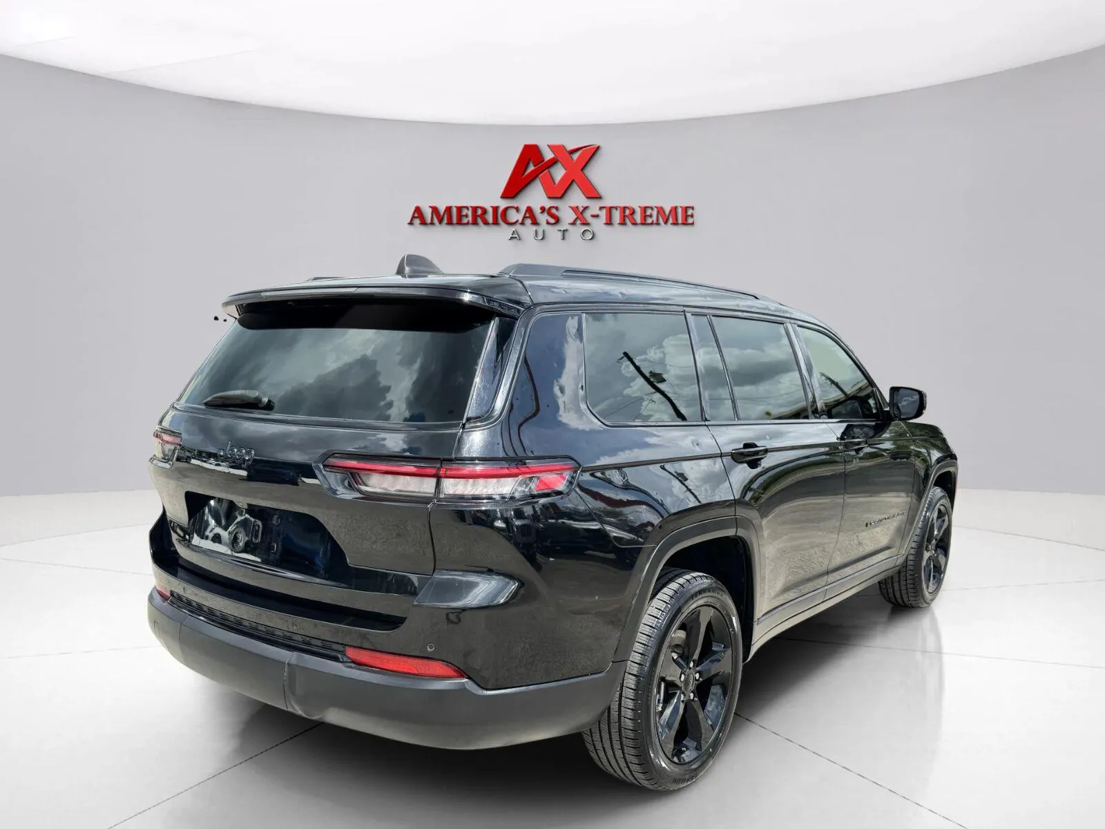 More photos of 2024 Jeep Grand Cherokee L Altitude at America's Xtreme Auto Sales & Auto Repair | Luxury Used Cars & Trucks Dealership, TX