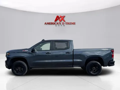 Photos of 2021 Chevrolet Silverado 1500 LT Trail Boss for sale in Houston, TX at America's Xtreme Auto Sales & Auto Repair | Luxury Used Cars & Trucks Dealership