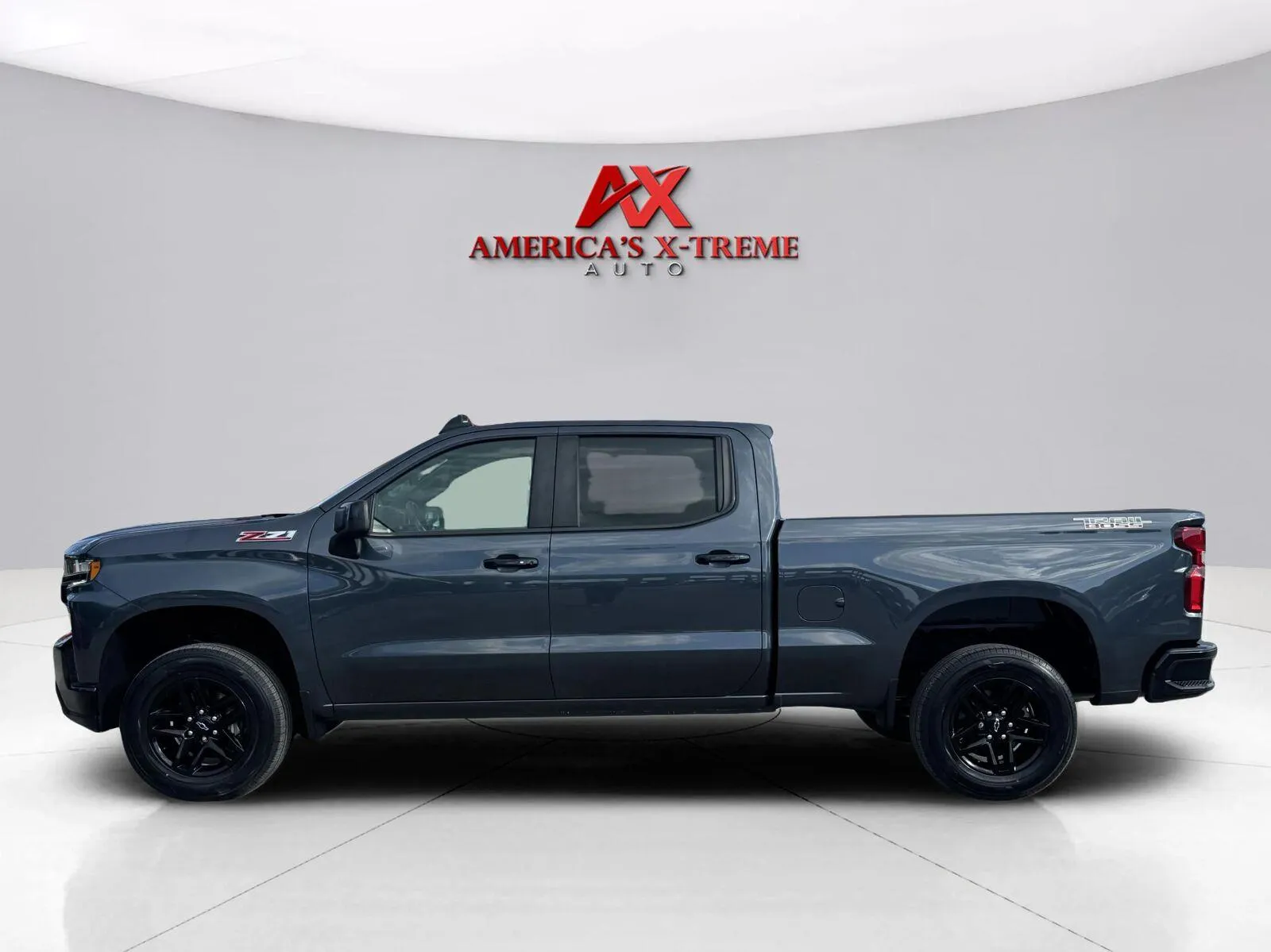 Photos of 2021 Chevrolet Silverado 1500 LT Trail Boss for sale in Houston, TX at America's Xtreme Auto Sales & Auto Repair | Luxury Used Cars & Trucks Dealership