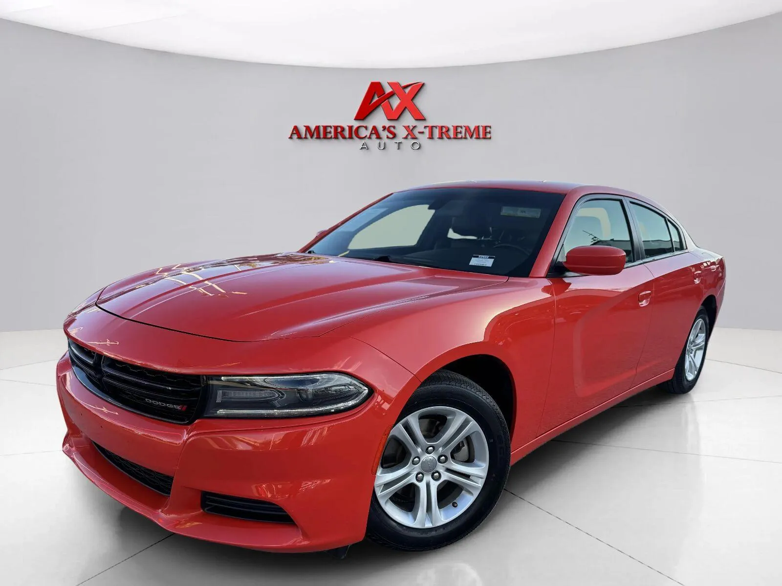 Orange 2021 Dodge Charger SXT for sale in Houston, TX