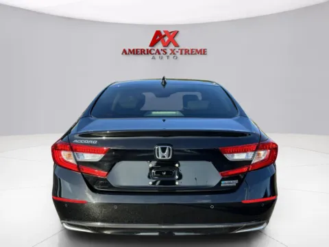 Photos of 2018 Honda Accord Hybrid Touring for sale in Houston, TX at America's Xtreme Auto Sales & Auto Repair | Luxury Used Cars & Trucks Dealership