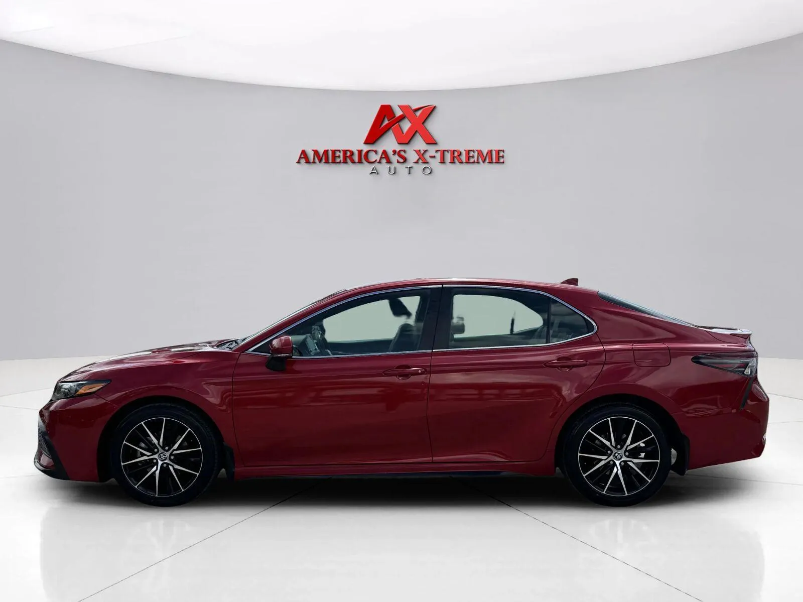Photos of 2023 Toyota Camry SE | SE Nightshade Edition | SE Nightshade Edition Hybrid for sale in Houston, TX at America's Xtreme Auto Sales & Auto Repair | Luxury Used Cars & Trucks Dealership
