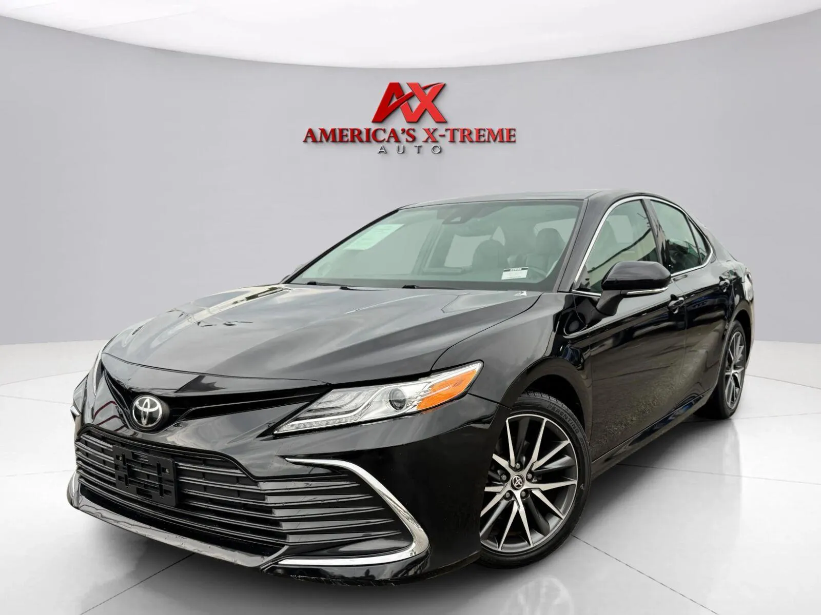 Black 2021 Toyota Camry XLE for sale in Houston, TX