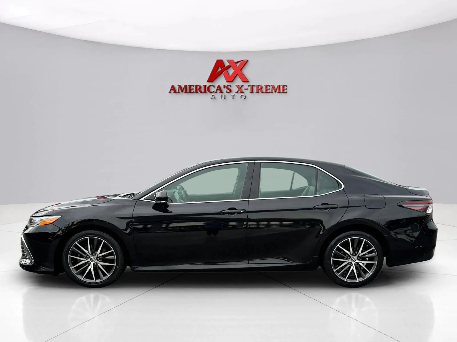 Photos of 2021 Toyota Camry XLE for sale in Houston, TX at America's Xtreme Auto Sales & Auto Repair | Luxury Used Cars & Trucks Dealership