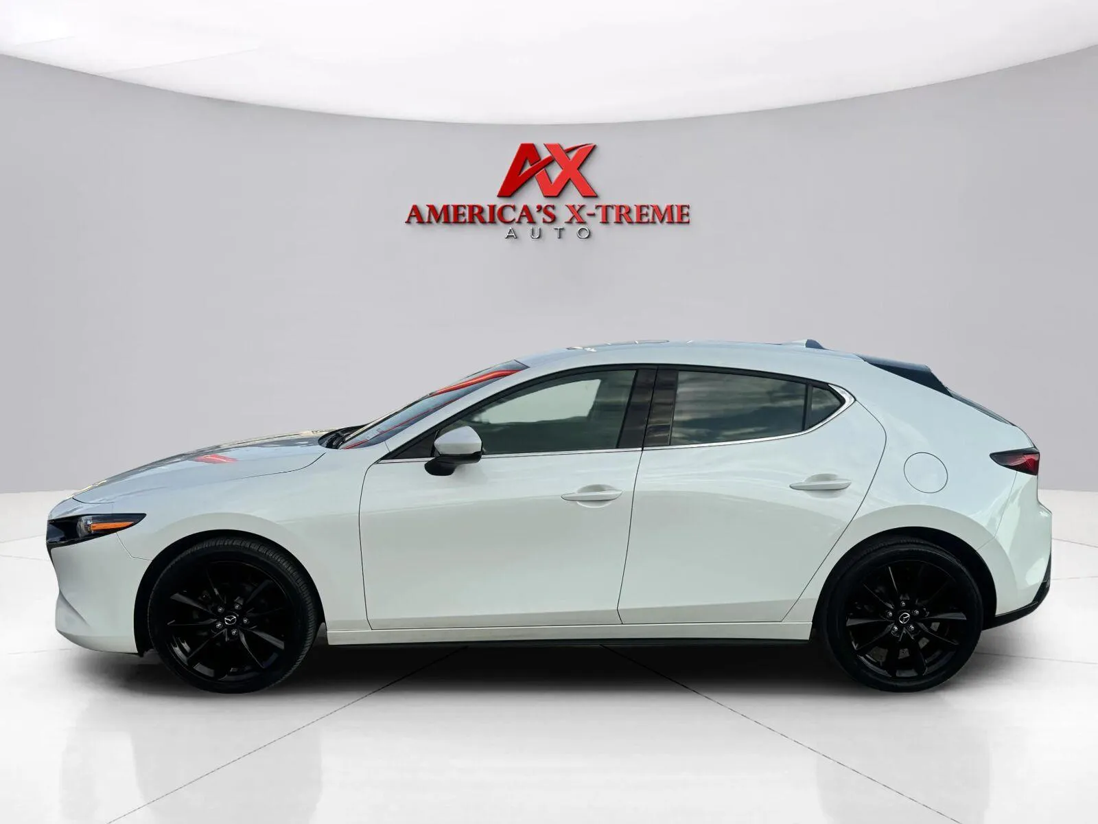Photos of 2025 Mazda Mazda3 Hatchback 2.5 S Premium for sale in Houston, TX at America's Xtreme Auto Sales & Auto Repair | Luxury Used Cars & Trucks Dealership