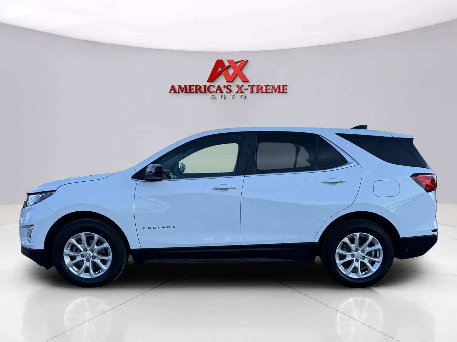 Photos of 2021 Chevrolet Equinox LT for sale in Houston, TX at America's Xtreme Auto Sales & Auto Repair | Luxury Used Cars & Trucks Dealership