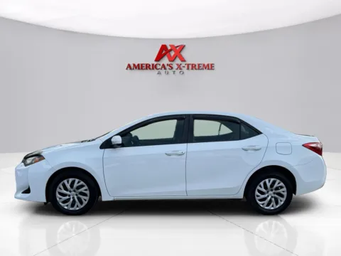 Photos of 2017 Toyota Corolla L for sale in Houston, TX at America's Xtreme Auto Sales & Auto Repair | Luxury Used Cars & Trucks Dealership