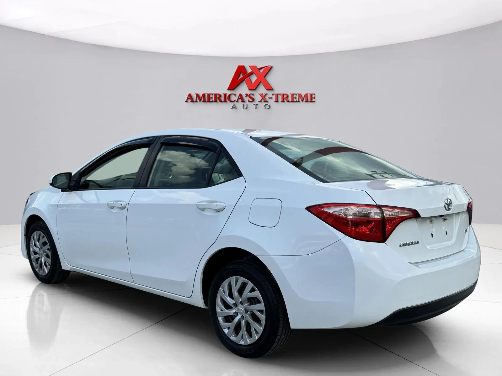 Another view of 2017 Toyota Corolla L for sale in Houston, TX at America's Xtreme Auto Sales & Auto Repair | Luxury Used Cars & Trucks Dealership