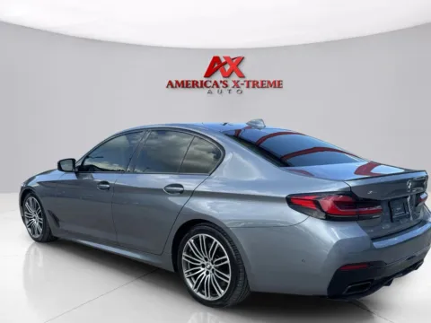 Another view of 2021 BMW 5 Series M550i xDrive for sale in Houston, TX at America's Xtreme Auto Sales & Auto Repair | Luxury Used Cars & Trucks Dealership