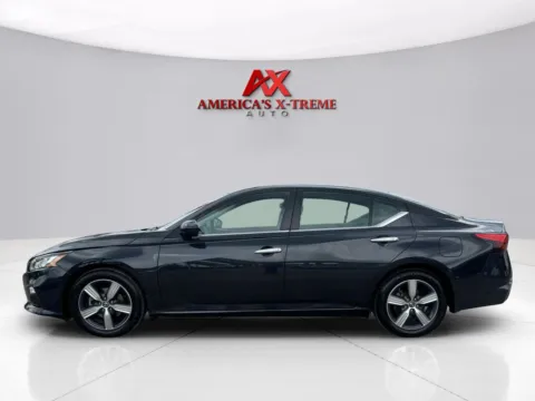 Photos of 2021 Nissan Altima 2.5 SV for sale in Houston, TX at America's Xtreme Auto Sales & Auto Repair | Luxury Used Cars & Trucks Dealership