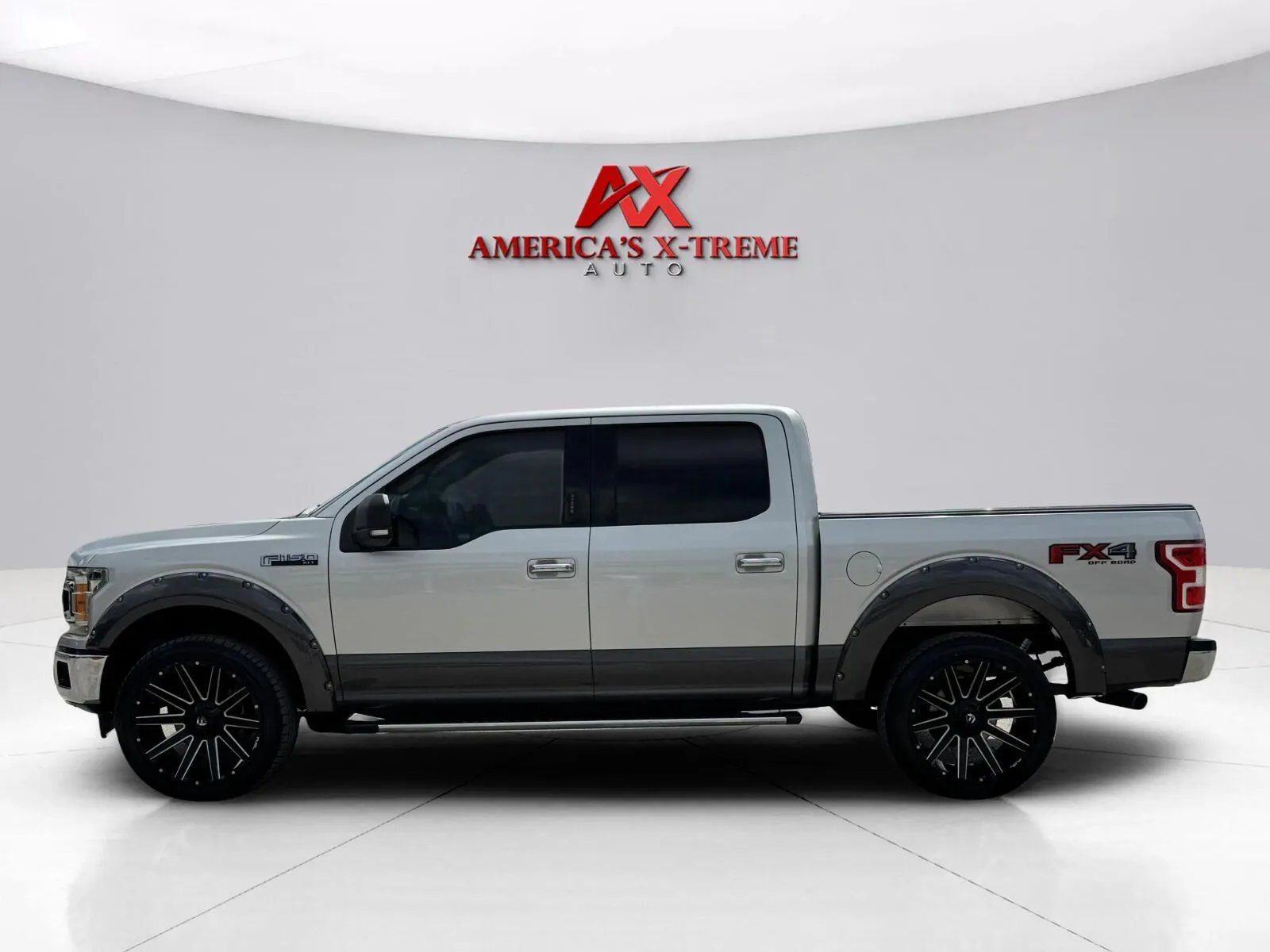 Photos of 2018 Ford F-150 XLT for sale in Houston, TX at America's Xtreme Auto Sales & Auto Repair | Luxury Used Cars & Trucks Dealership