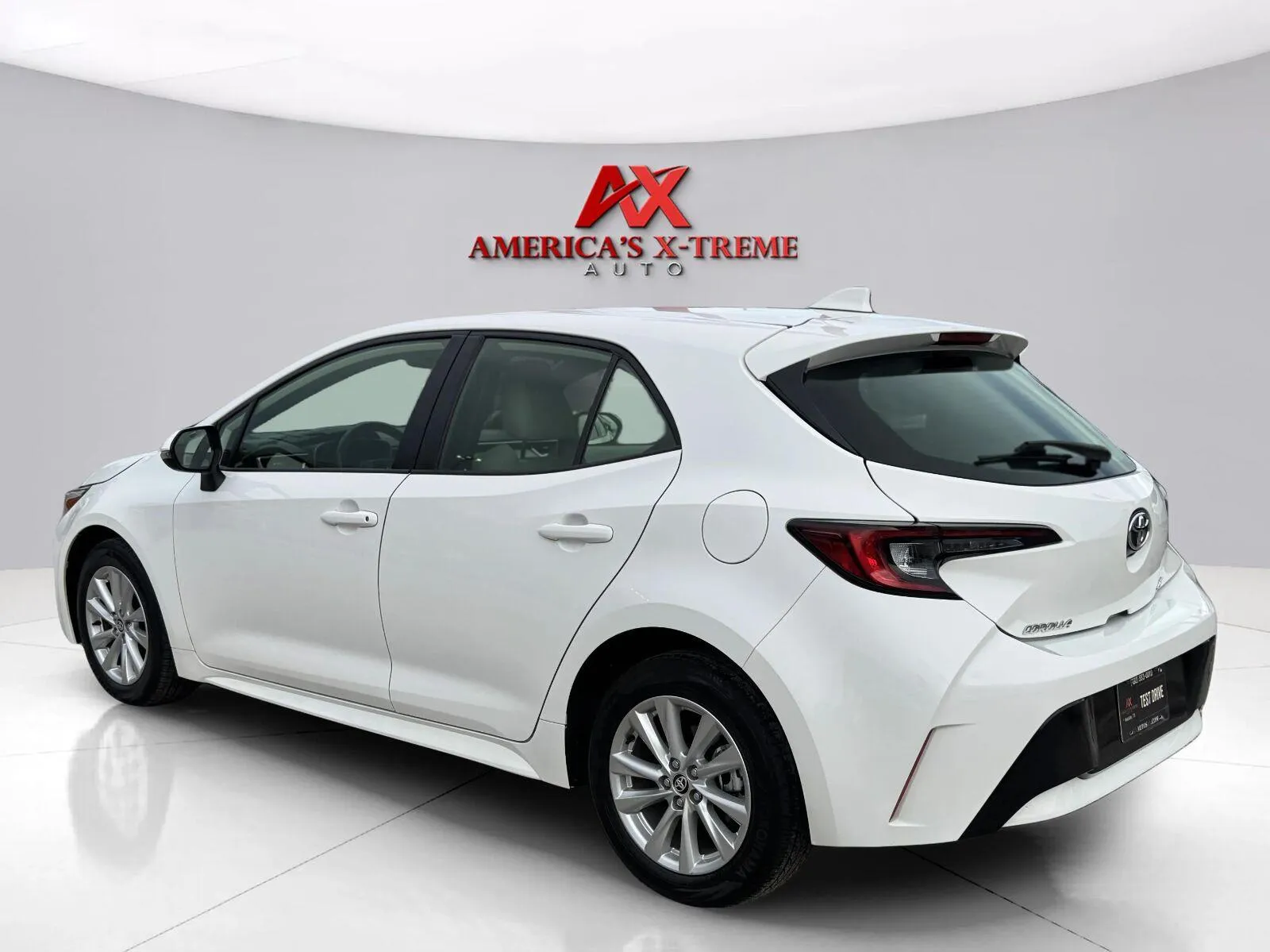 Another view of 2024 Toyota Corolla Hatchback SE for sale in Houston, TX at America's Xtreme Auto Sales & Auto Repair | Luxury Used Cars & Trucks Dealership