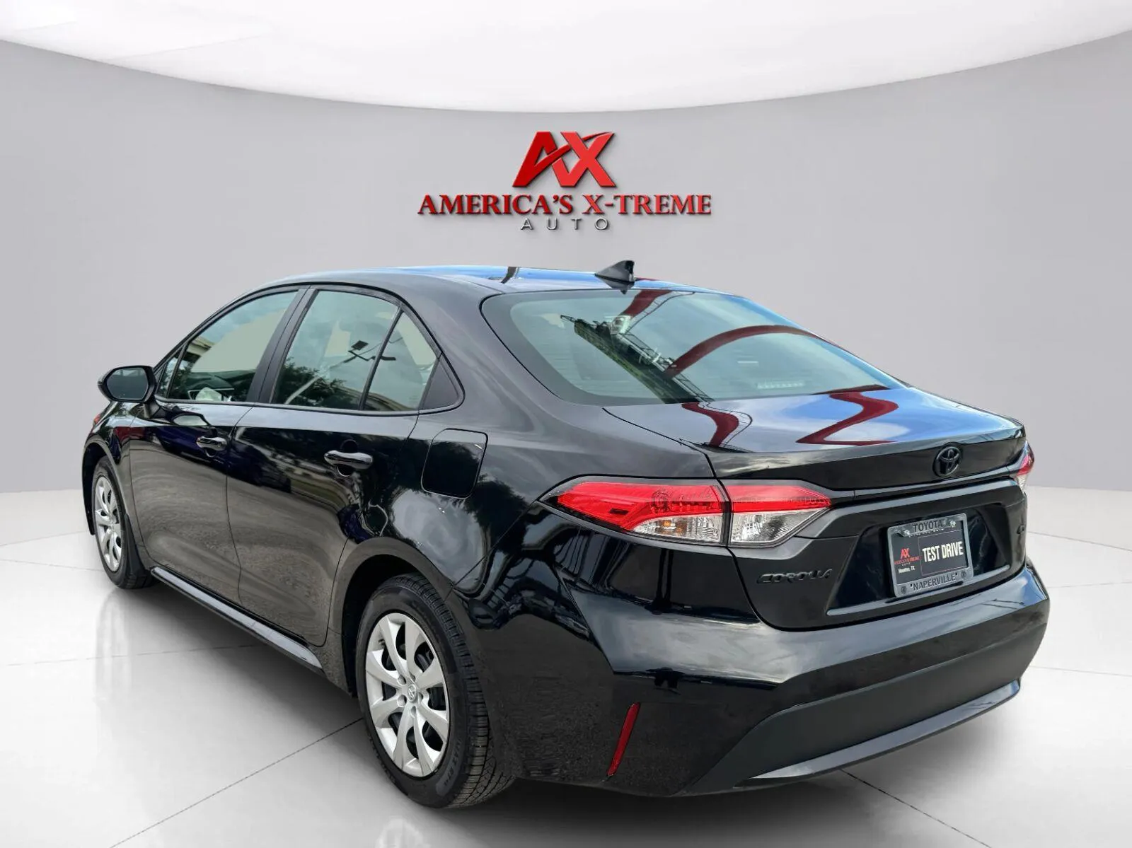Another view of 2021 Toyota Corolla LE for sale in Houston, TX at America's Xtreme Auto Sales & Auto Repair | Luxury Used Cars & Trucks Dealership