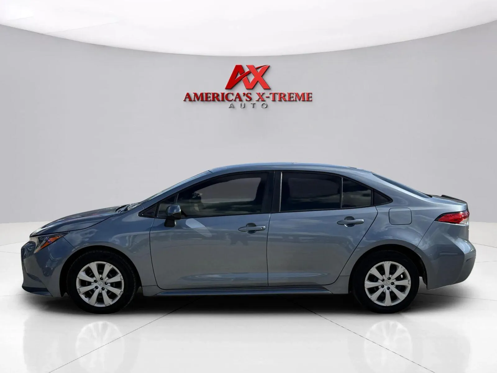 Photos of 2021 Toyota Corolla LE for sale in Houston, TX at America's Xtreme Auto Sales & Auto Repair | Luxury Used Cars & Trucks Dealership