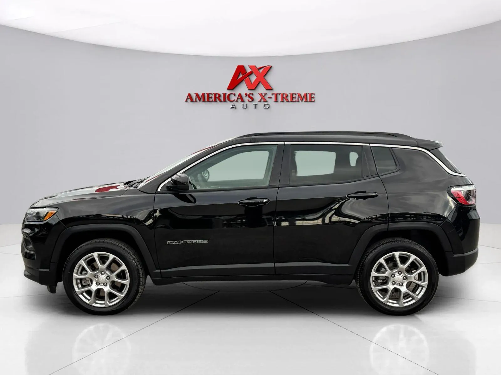 Photos of 2024 Jeep Compass Latitude Lux for sale in Houston, TX at America's Xtreme Auto Sales & Auto Repair | Luxury Used Cars & Trucks Dealership