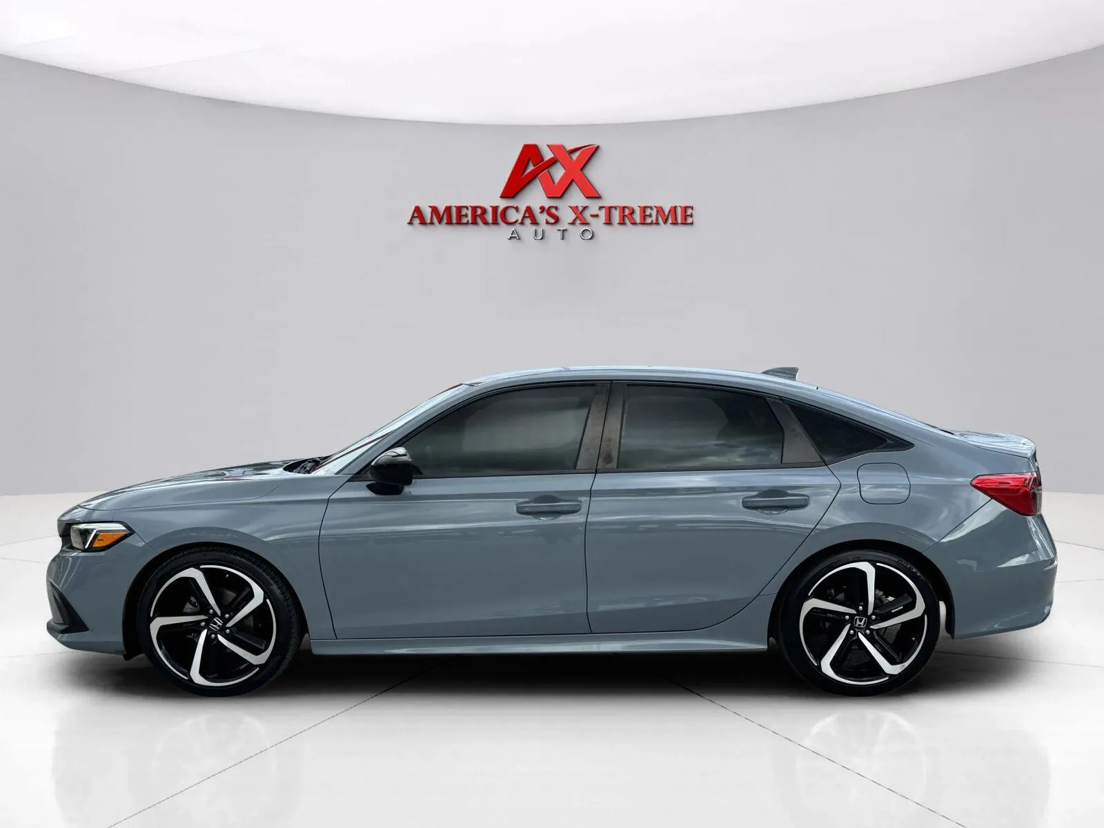 Photos of 2023 Honda Civic Sport for sale in Houston, TX at America's Xtreme Auto Sales & Auto Repair | Luxury Used Cars & Trucks Dealership