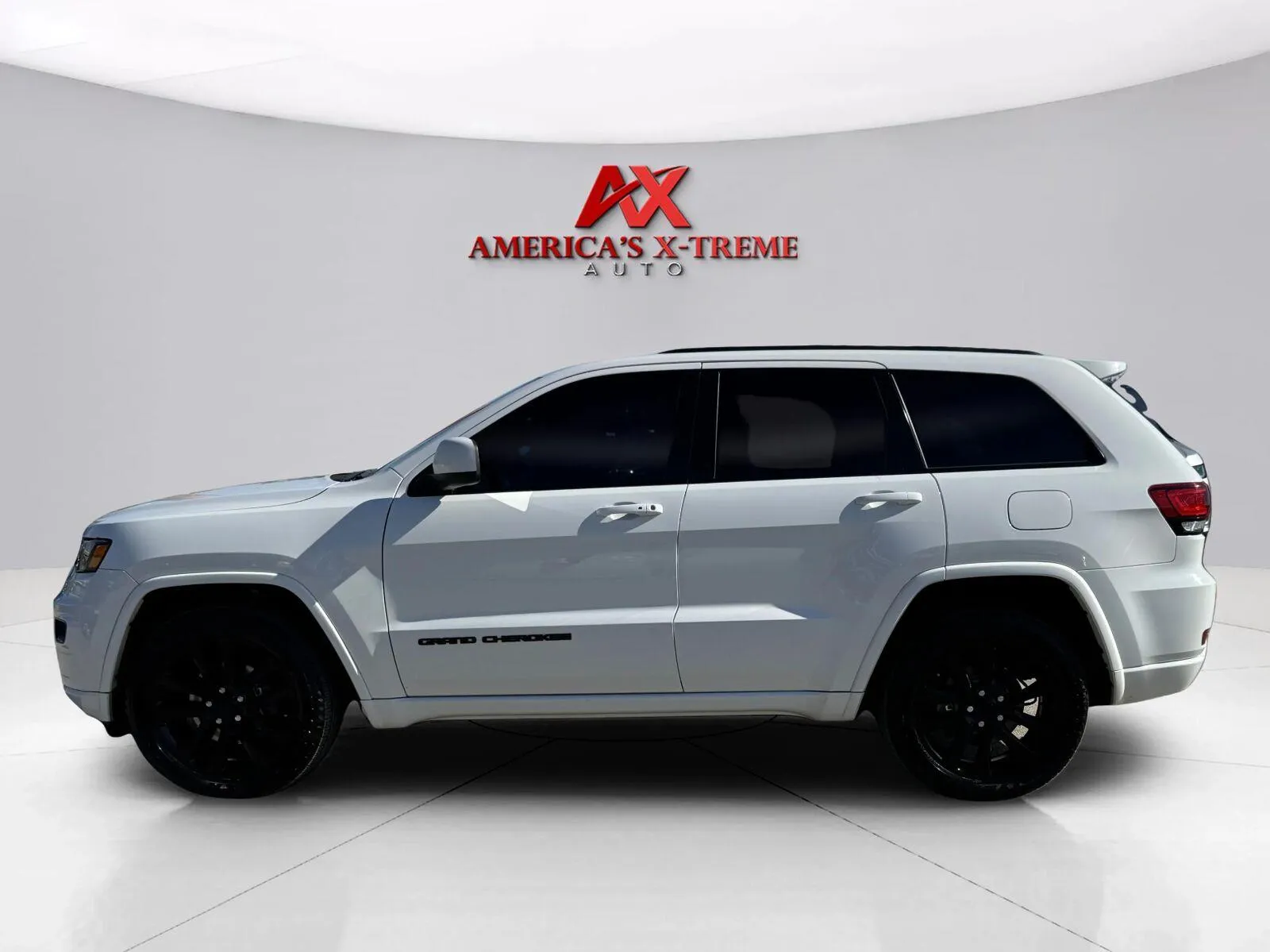 Photos of 2019 Jeep Grand Cherokee Altitude for sale in Houston, TX at America's Xtreme Auto Sales & Auto Repair | Luxury Used Cars & Trucks Dealership
