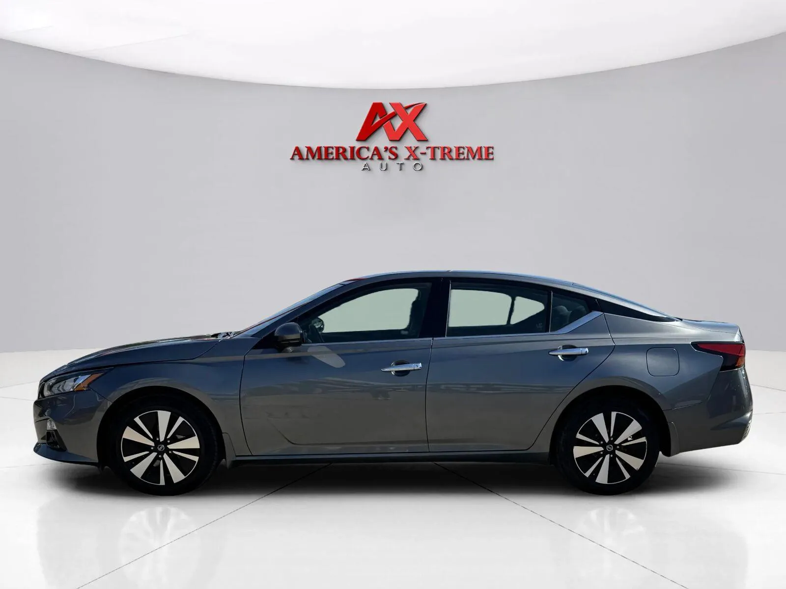 Photos of 2020 Nissan Altima 2.5 SV for sale in Houston, TX at America's Xtreme Auto Sales & Auto Repair | Luxury Used Cars & Trucks Dealership