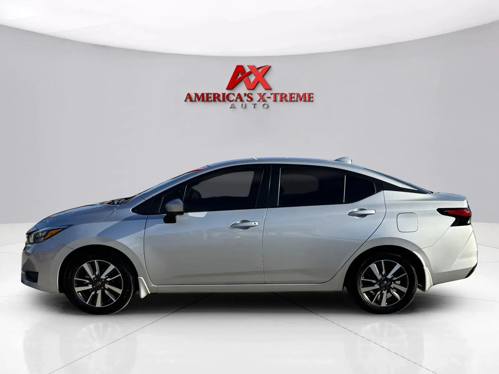 Photos of 2025 Nissan Versa SV for sale in Houston, TX at America's Xtreme Auto Sales & Auto Repair | Luxury Used Cars & Trucks Dealership