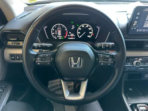 Photos of 2023 Honda Pilot EX-L for sale in Webster, NY at Marina Chrysler Dodge Jeep Ram