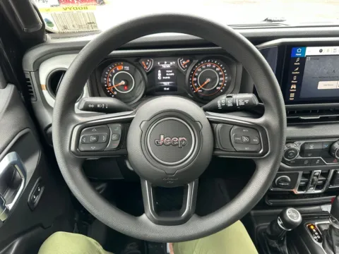 Photos of 2026 Jeep Wrangler Sport for sale in Webster, NY at Marina Chrysler Dodge Jeep Ram