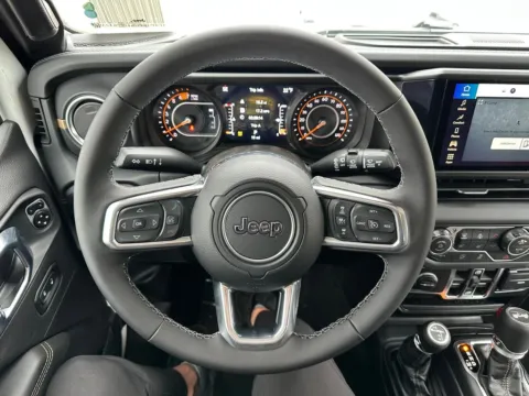 Photos of 2026 Jeep Wrangler Sahara for sale in Webster, NY at Marina Chrysler Dodge Jeep Ram