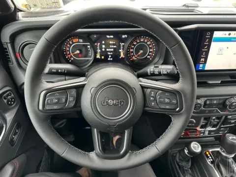 Photos of 2026 Jeep Wrangler Rubicon for sale in Webster, NY at Marina Chrysler Dodge Jeep Ram