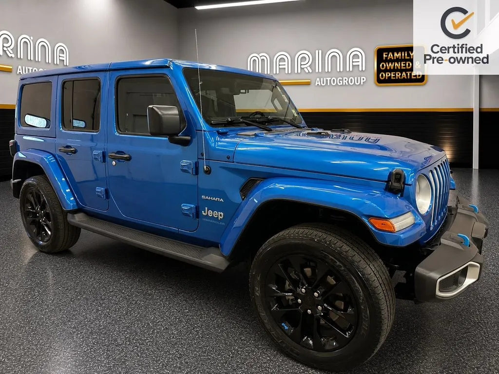 Blue 2023 Jeep Wrangler Sahara 4xe for sale in Webster, NY