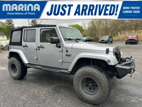 Silver 2016 Jeep Wrangler Unlimited Sport for sale in Webster, NY