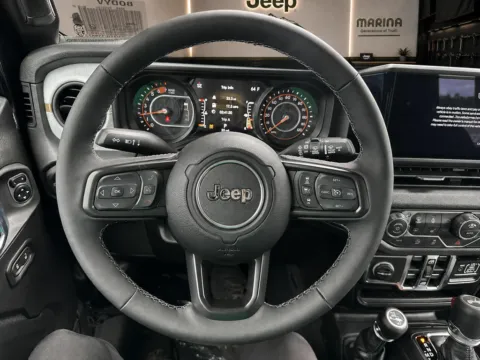 Photos of 2026 Jeep Wrangler Sport S for sale in Webster, NY at Marina Chrysler Dodge Jeep Ram