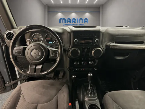 Photos of 2018 Jeep Wrangler JK Sport for sale in Webster, NY at Marina Chrysler Dodge Jeep Ram