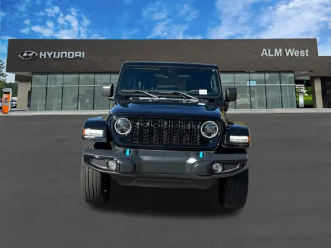Photos of 2024 Jeep Wrangler Sahara 4xe for sale in Lithia Springs, GA at ALM Hyundai West