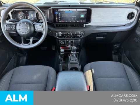 Photos of 2024 Jeep Wrangler Sport for sale in Macon, GA at ALM CDJR Macon