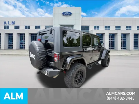 More photos of 2013 Jeep Wrangler Unlimited Sahara at ALM Ford Marietta, GA