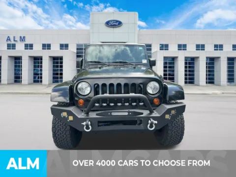 Photos of 2013 Jeep Wrangler Unlimited Sahara for sale in Marietta, GA at ALM Ford Marietta