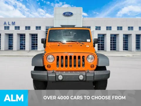 Photos of 2013 Jeep Wrangler Unlimited Sport for sale in Marietta, GA at ALM Ford Marietta