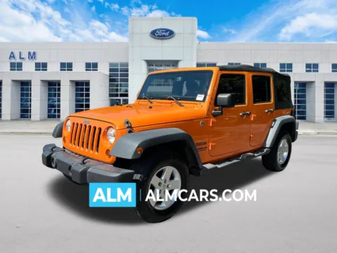 Orange 2013 Jeep Wrangler Unlimited Sport for sale in Marietta, GA
