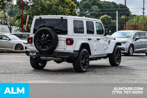 More photos of 2024 Jeep Wrangler Sahara 4xe at ALM Newnan, GA