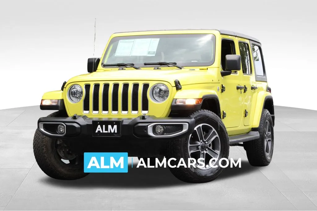 Yellow 2023 Jeep Wrangler Sahara for sale in Roswell, GA
