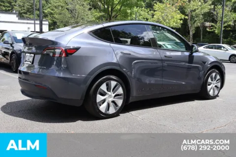 More photos of 2023 Tesla Model Y Long Range at ALM Roswell, GA