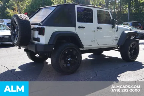 More photos of 2011 Jeep Wrangler Unlimited Sport at ALM Roswell, GA