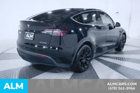 More photos of 2023 Tesla Model Y Long Range at ALM Kia South, GA