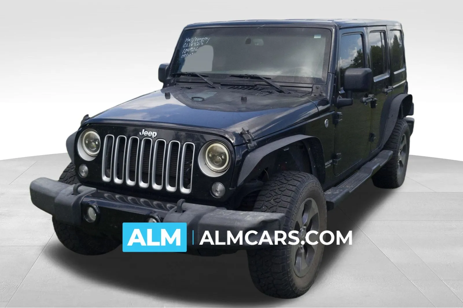Black 2016 Jeep Wrangler Unlimited Sahara for sale in Lumberton, NC