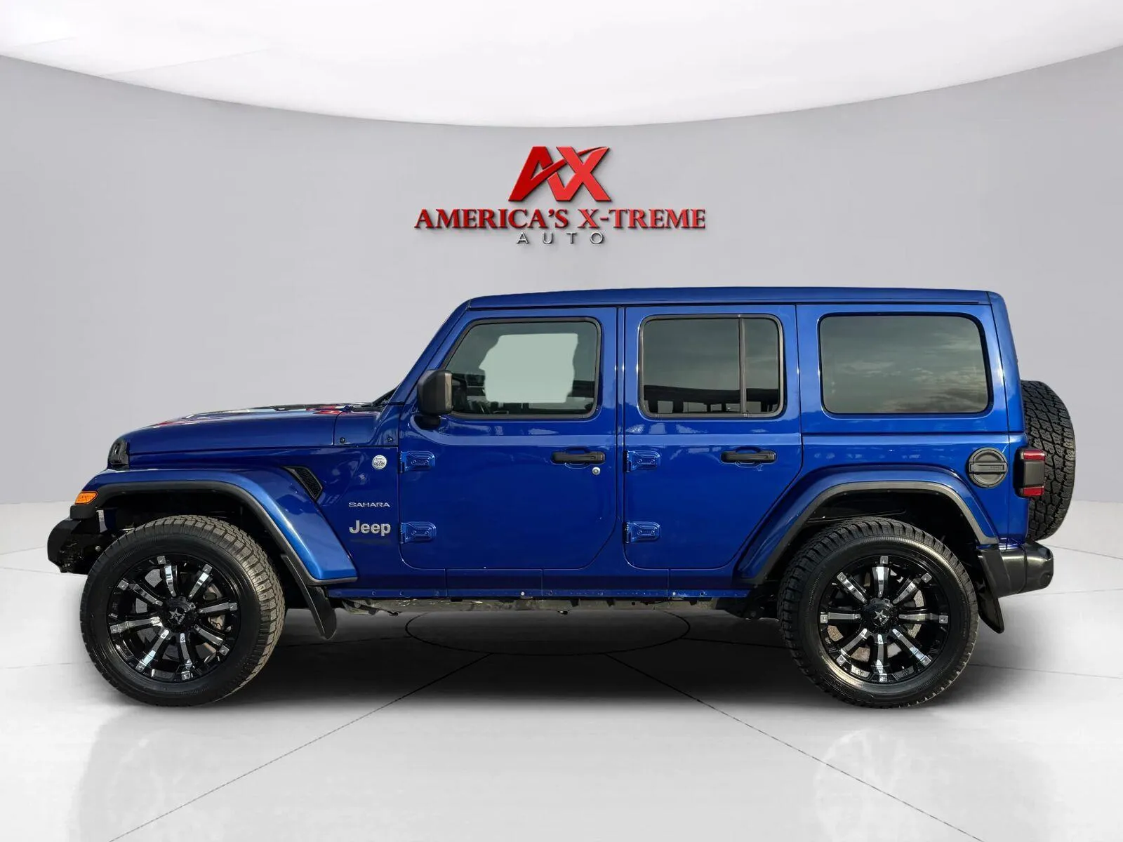 Photos of 2019 Jeep Wrangler Unlimited Sahara for sale in Houston, TX at America's Xtreme Auto