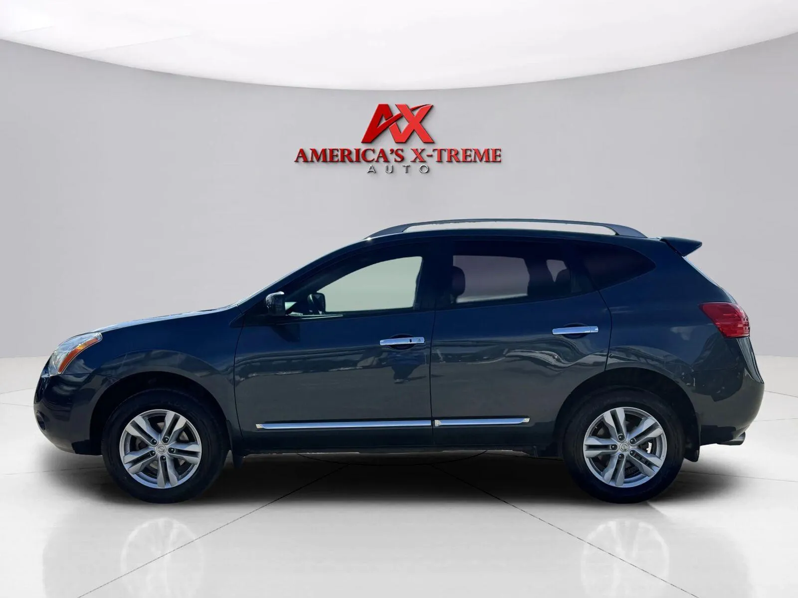 Photos of 2013 Nissan Rogue SV for sale in Houston, TX at America's Xtreme Auto