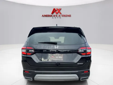 More photos of 2023 Honda Pilot Touring at America's Xtreme Auto, TX