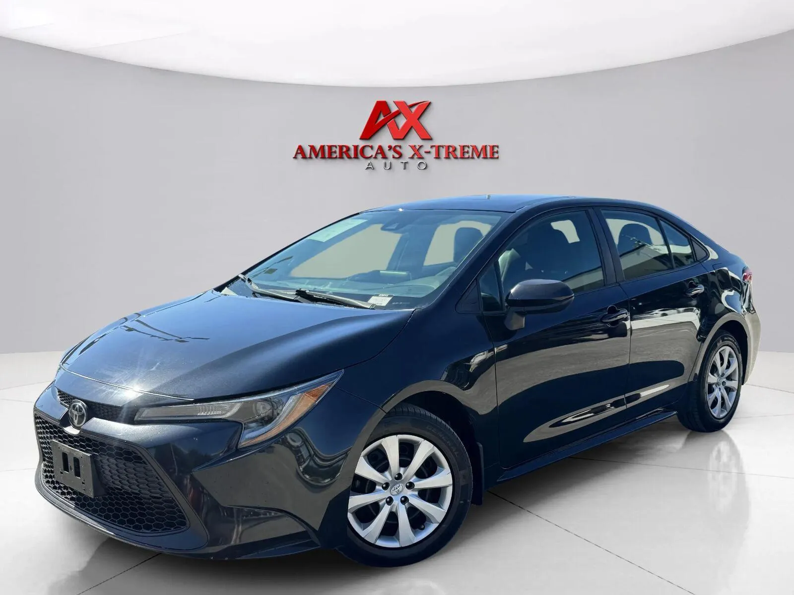 Black 2021 Toyota Corolla LE for sale in Houston, TX